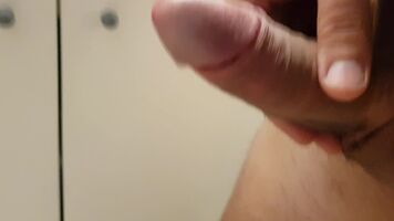 Me leaking in the bathroom of a friend's place. Her cleavage is draining my balls. And I think her husband has noticed it...