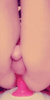 Lucky sissy in pink cage cumming from pink dildo