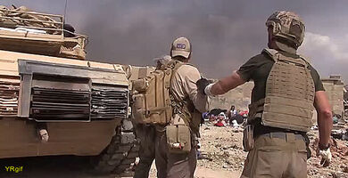 Marines extract a little girl from the kill zone