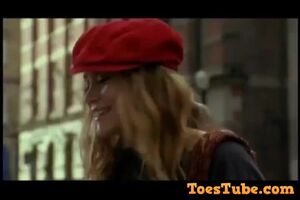 Ashley Olsen kissing Mary-Kate Olsen's feet after she sticks them in her face