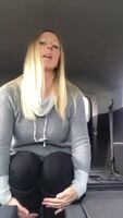 MILF gets herself off in a car