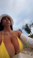 Big tits in bikini + bike
