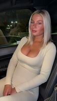Blonde reveals her tits in the car