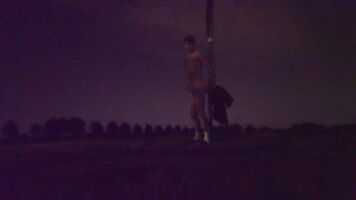All alone, between the fields and a street... well, some cars passed by. Did you see me playing with my dildo?