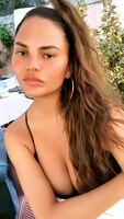 Chrissy Teigen showing off her cleavage