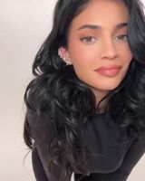 Kylie wearing the long sleeve thumb hole tee and footed legging - IG May 2025