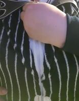*singing * What's this?!?!? There seems to be some tits but they are not quite bare. She only unzips a little but there's so much more hiding under thereeee. What's this?!?!