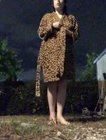 Stripping nude in my apartment backyard. There’s a parking lot light that makes it so bright!