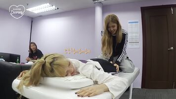 Rosé spanks Lisa's booty during a massage.