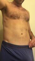Rock hard reveal. All that exercise makes for a firm friend on a boring Christmas Eve.