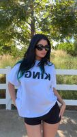 Kylie in white tee and black tight shorts - TikTok October 2025