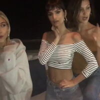Emily Ratajkowski getting felt up by Bella Hadid. I can't imagine this is the first time this has happened. I can believe first time with clothes on.