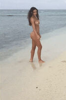 Alexis Ren teasing all the men in the beach. What a whore. We should punish her.